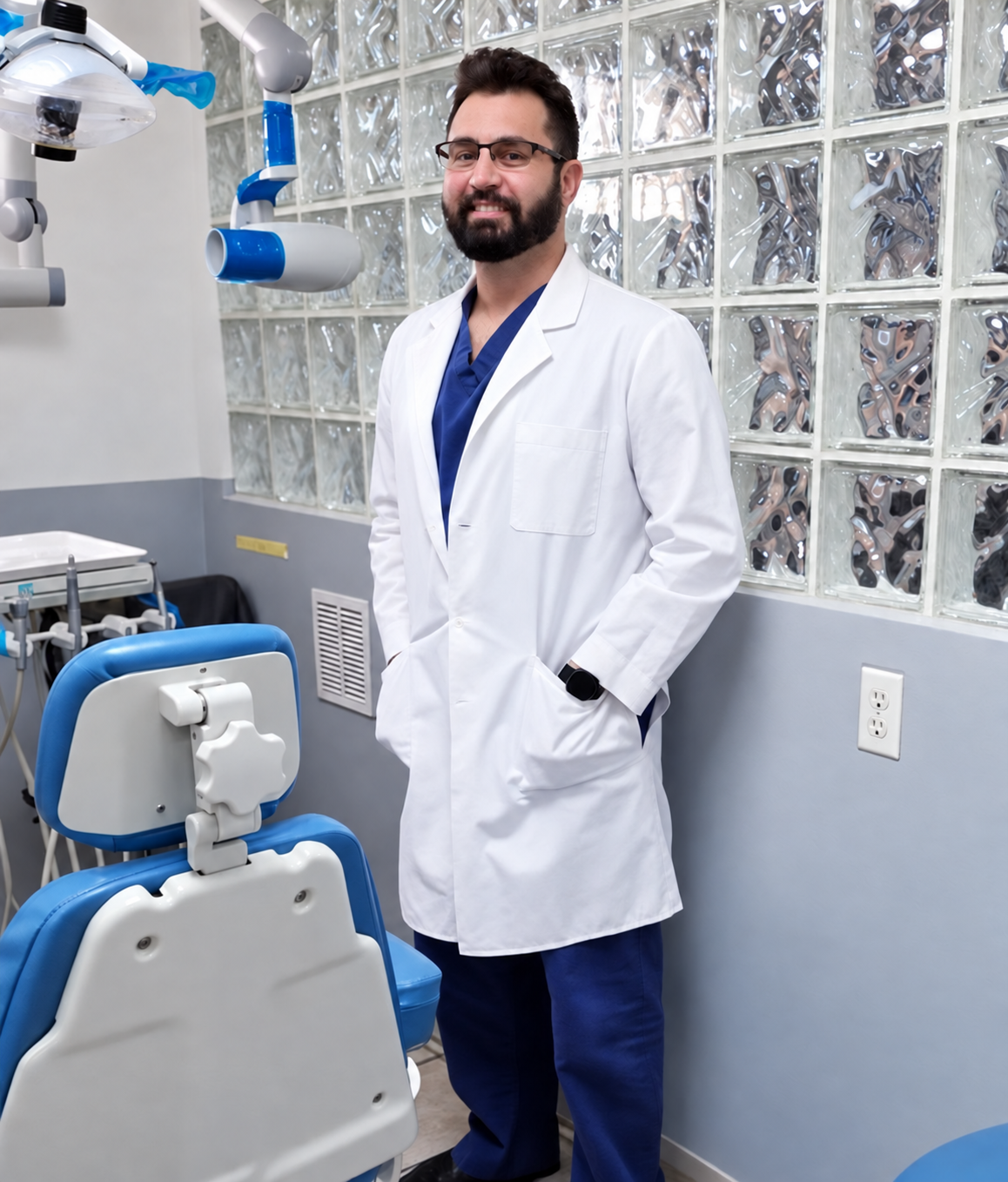 Dentist standing in the dental office.